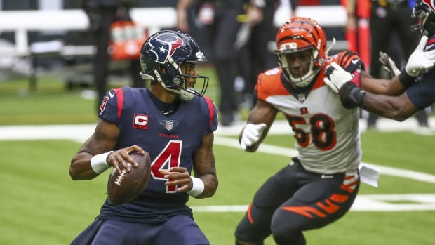 Dec 27, 2020; Houston, Texas, USA; Houston Texans quarterback Deshaun Watson (4) looks for an open receiver against the Cincinnati Bengals during the second quarter at NRG Stadium. Mandatory Credit: Troy Taormina-USA TODAY Sports